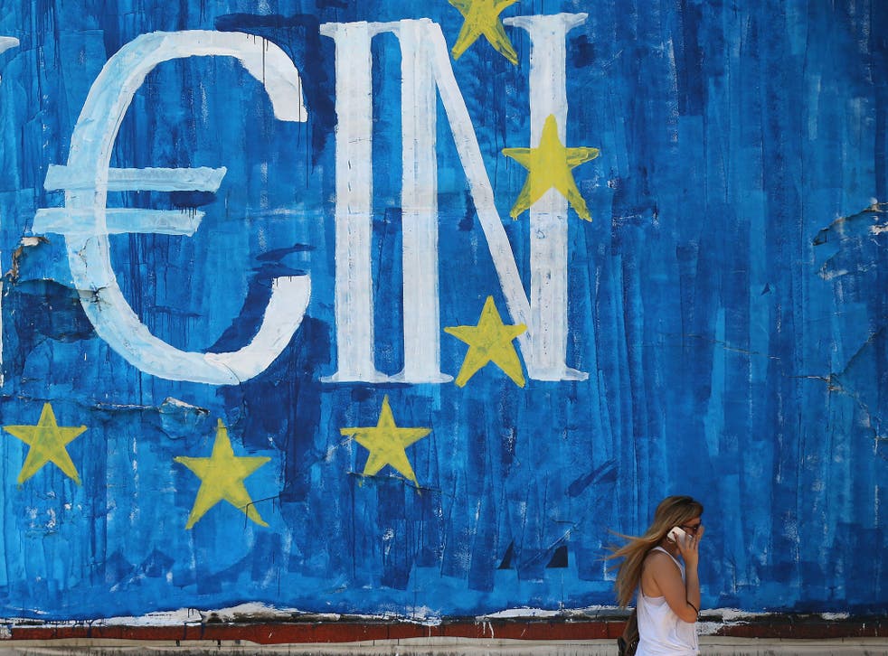 Graffiti art displaying the European Union (EU) flag and a euro symbol
