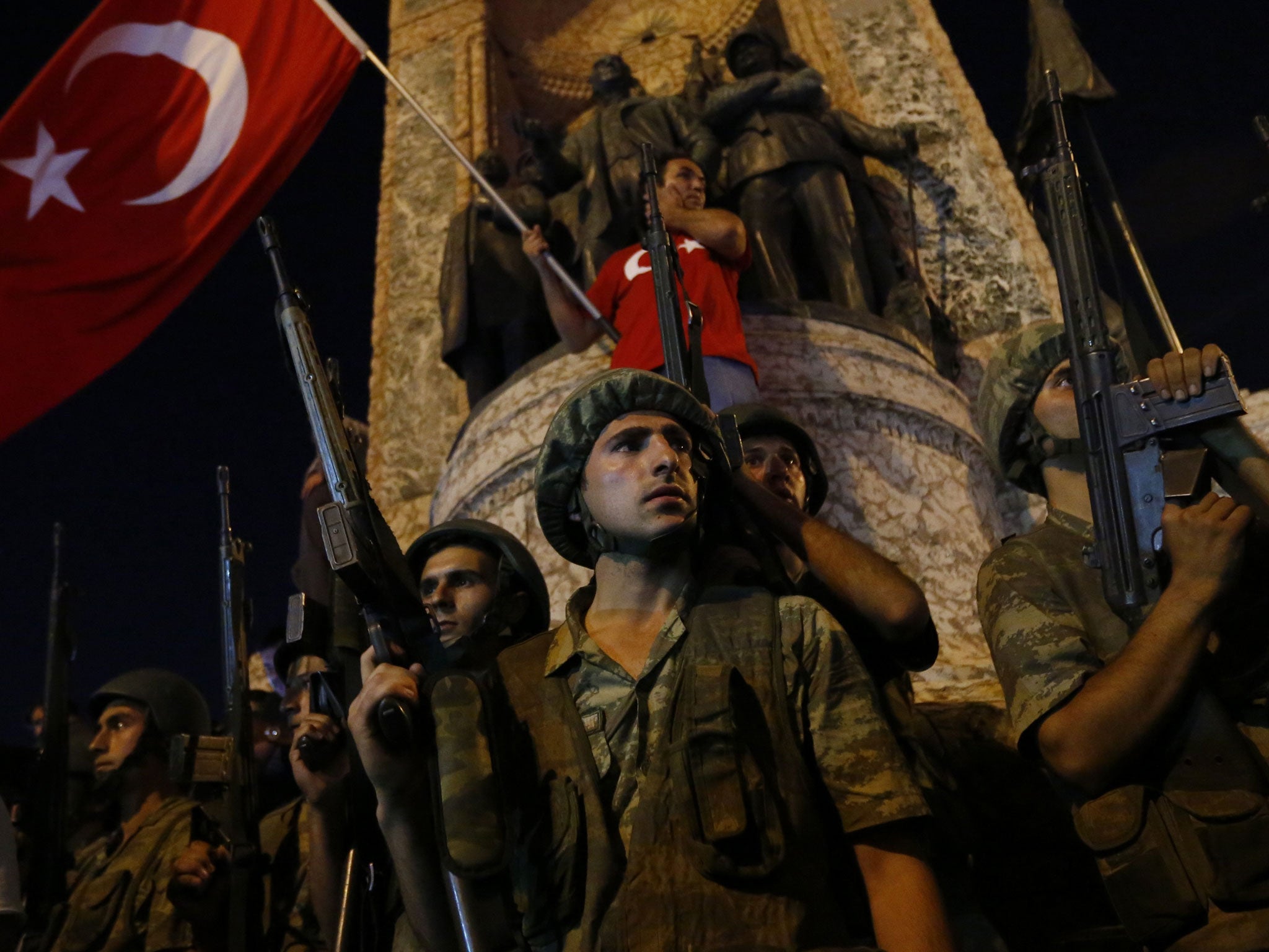 Turkish soldiers, pictured during the failed coup in Turkey last night
