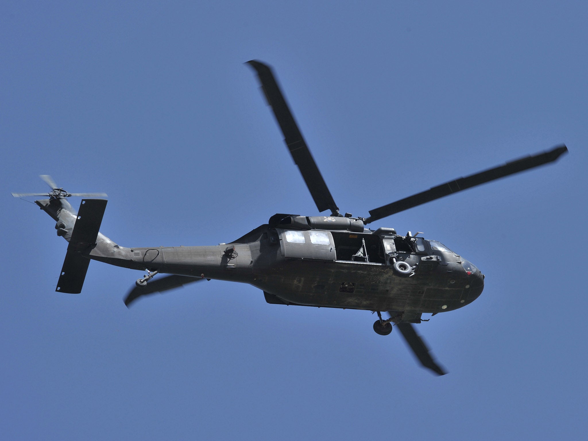 Seven military personnel and one civilian landed in northern Greece in a Blackhawk helicopter