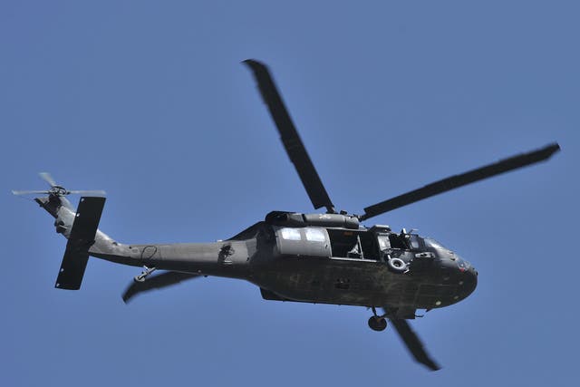 Seven military personnel and one civilian landed in northern Greece in a Blackhawk helicopter