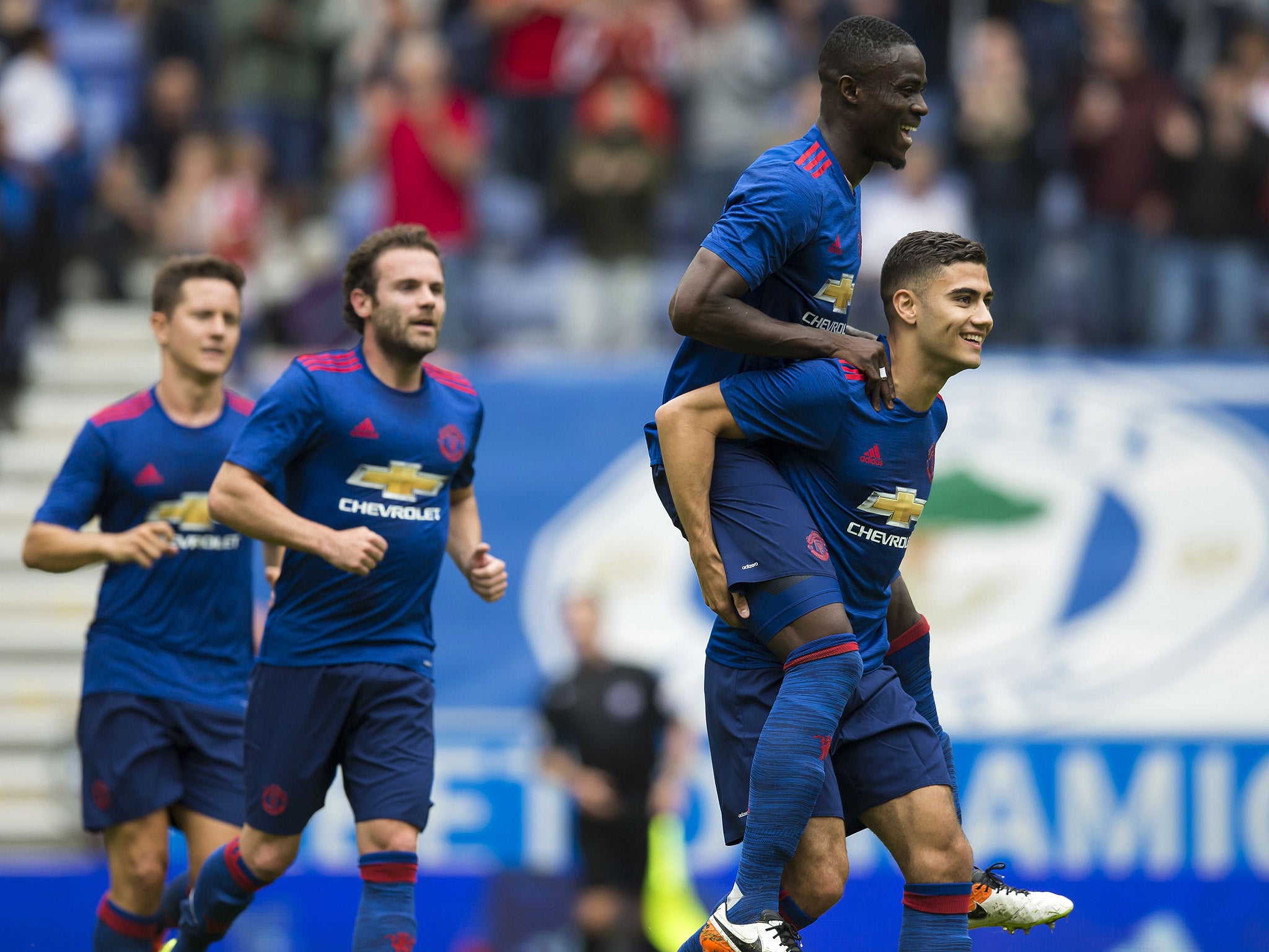 Eric Bailly celebrates with Andreas Pereira after he scored the second goal