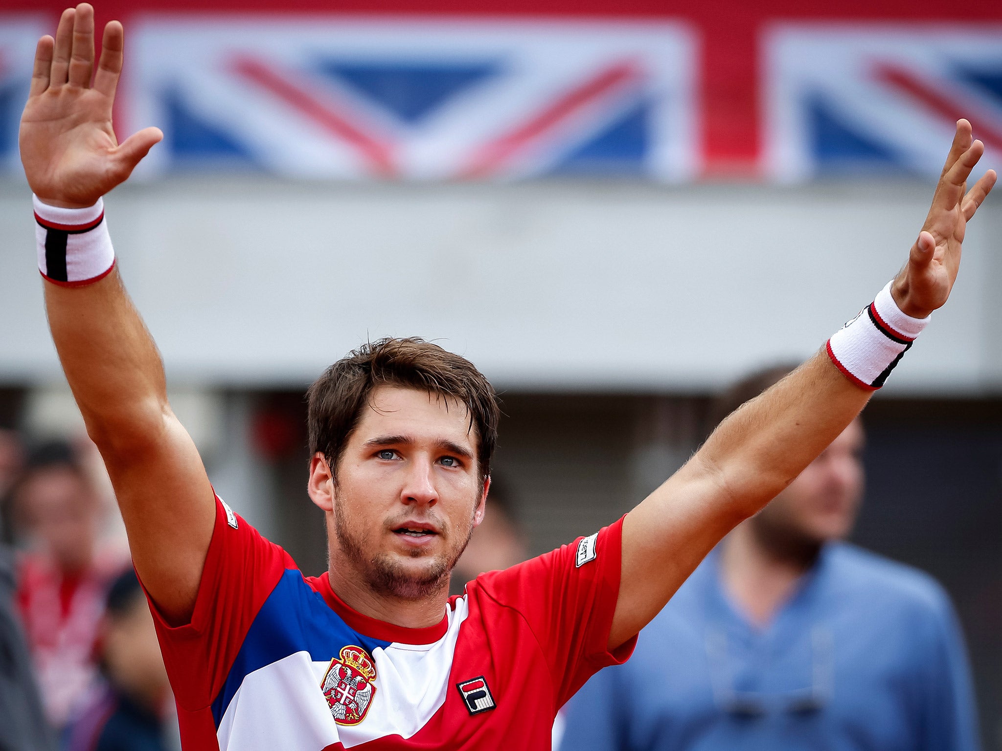 Dusan Lajovic celebrates his victory over James Ward in the Davis Cup quarter-finals