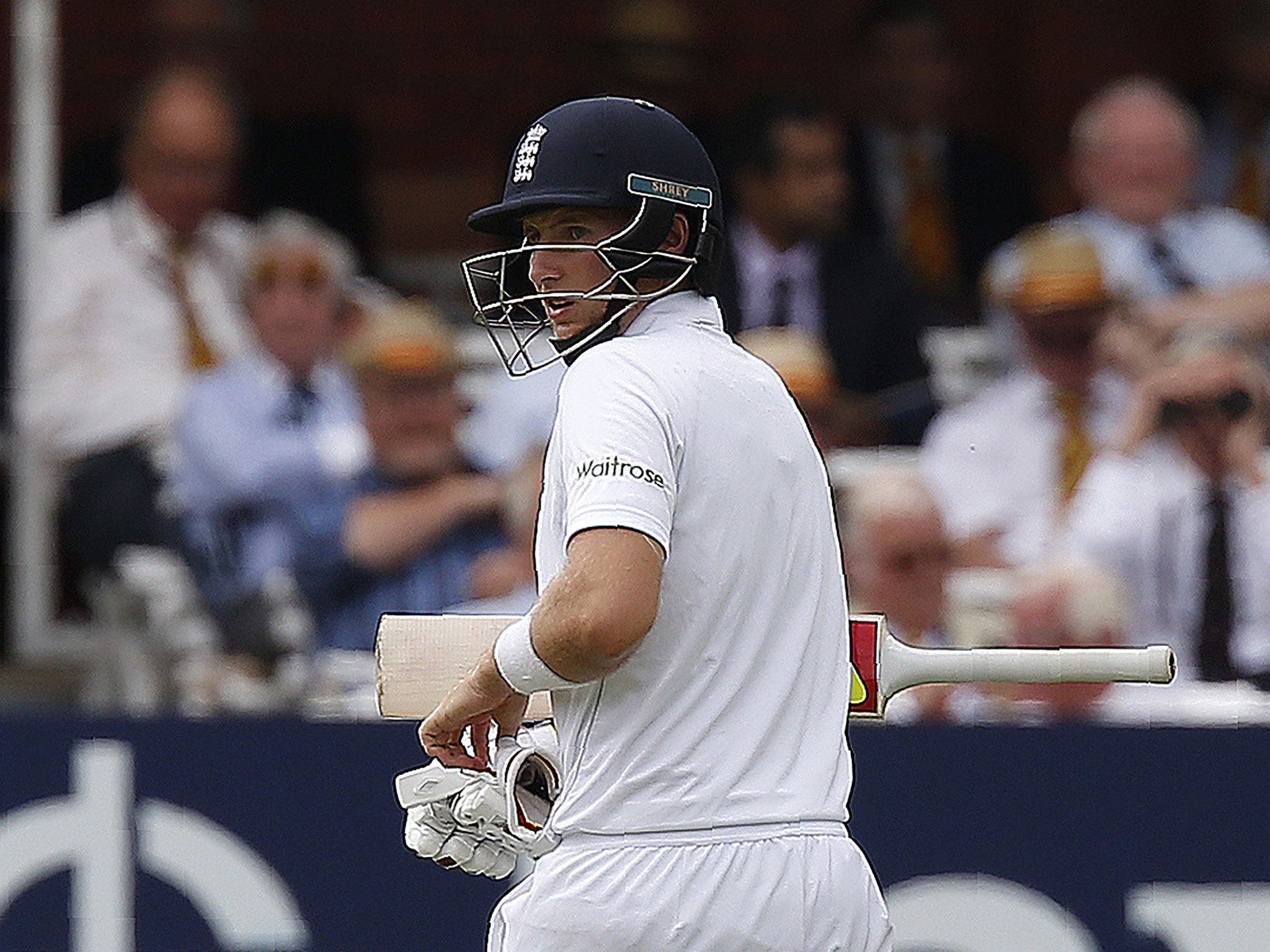 Joe Root walks back to the pavilion after losing his wicket for nine runs