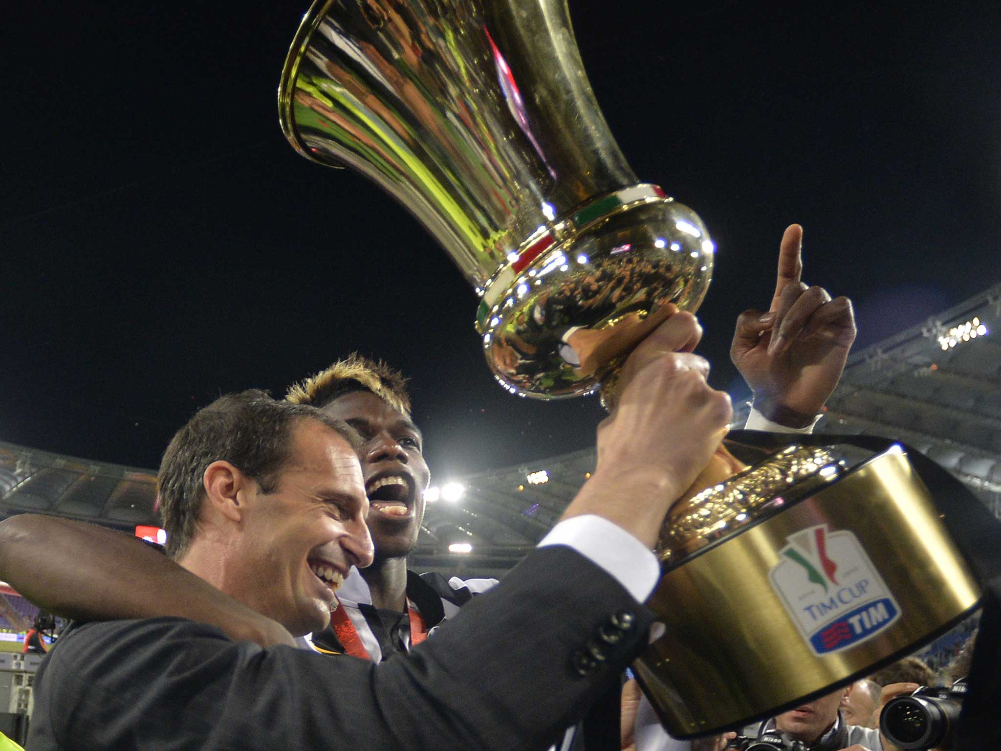 Massimiliano Allegri and Paul Pogba celebrate one of many Juventus successes