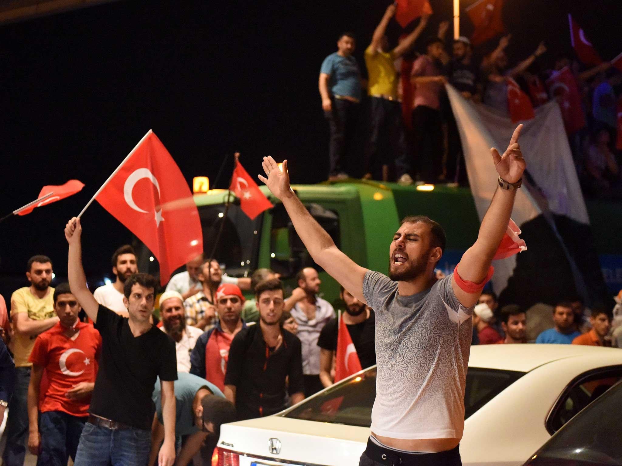 A rally in support of Turkish President Recep Tayyip Erdogan at the Ataturk airport in Istanbul on July 18 2016, three days after an attempted military coup failed to oust him from office