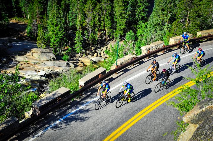 The route takes riders along roads lined by conifers and aspens