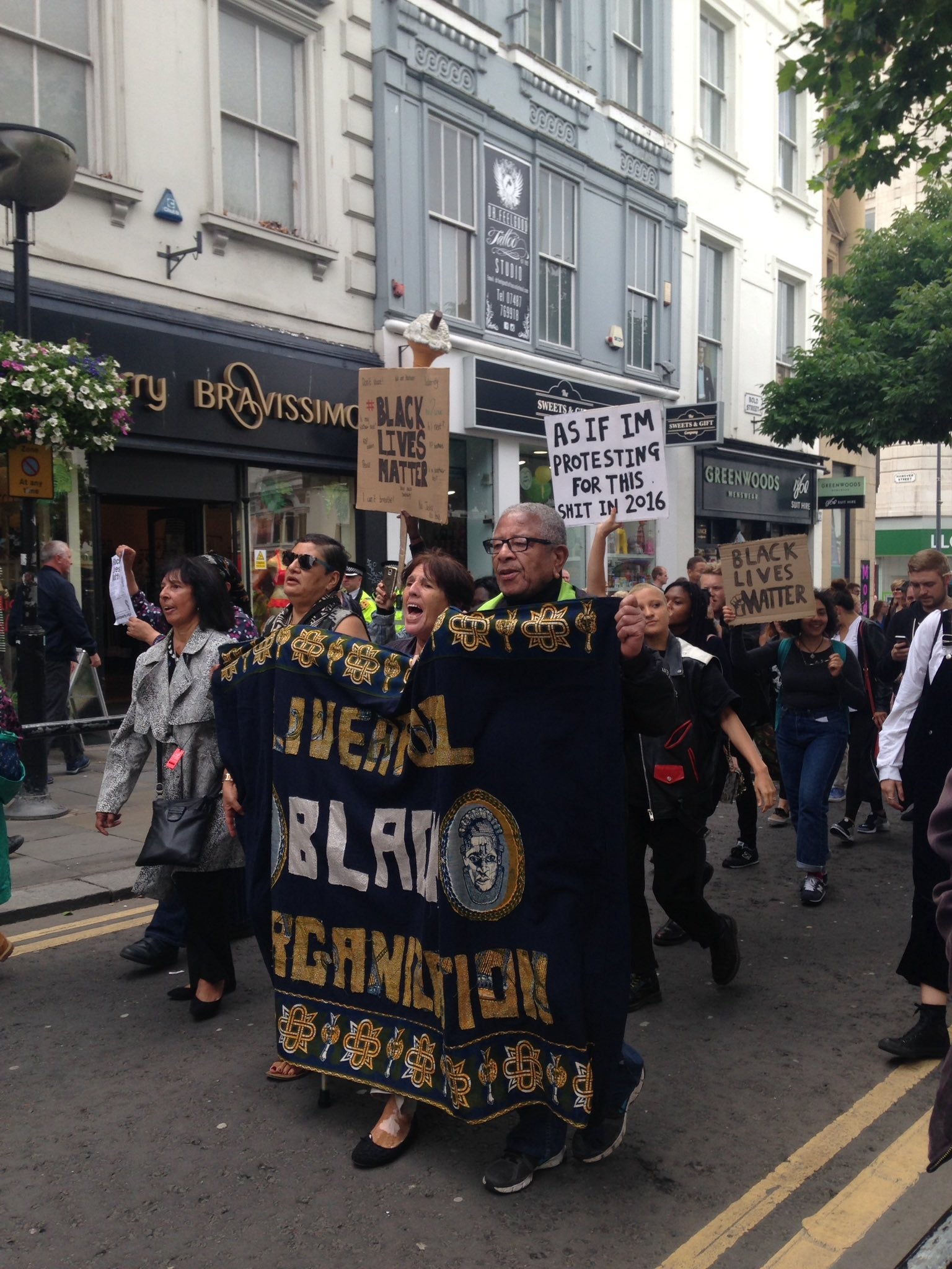 Around 300 people marched from Liverpool's main train station to the shopping centre demanding answers about Mzee Mohammed's death
