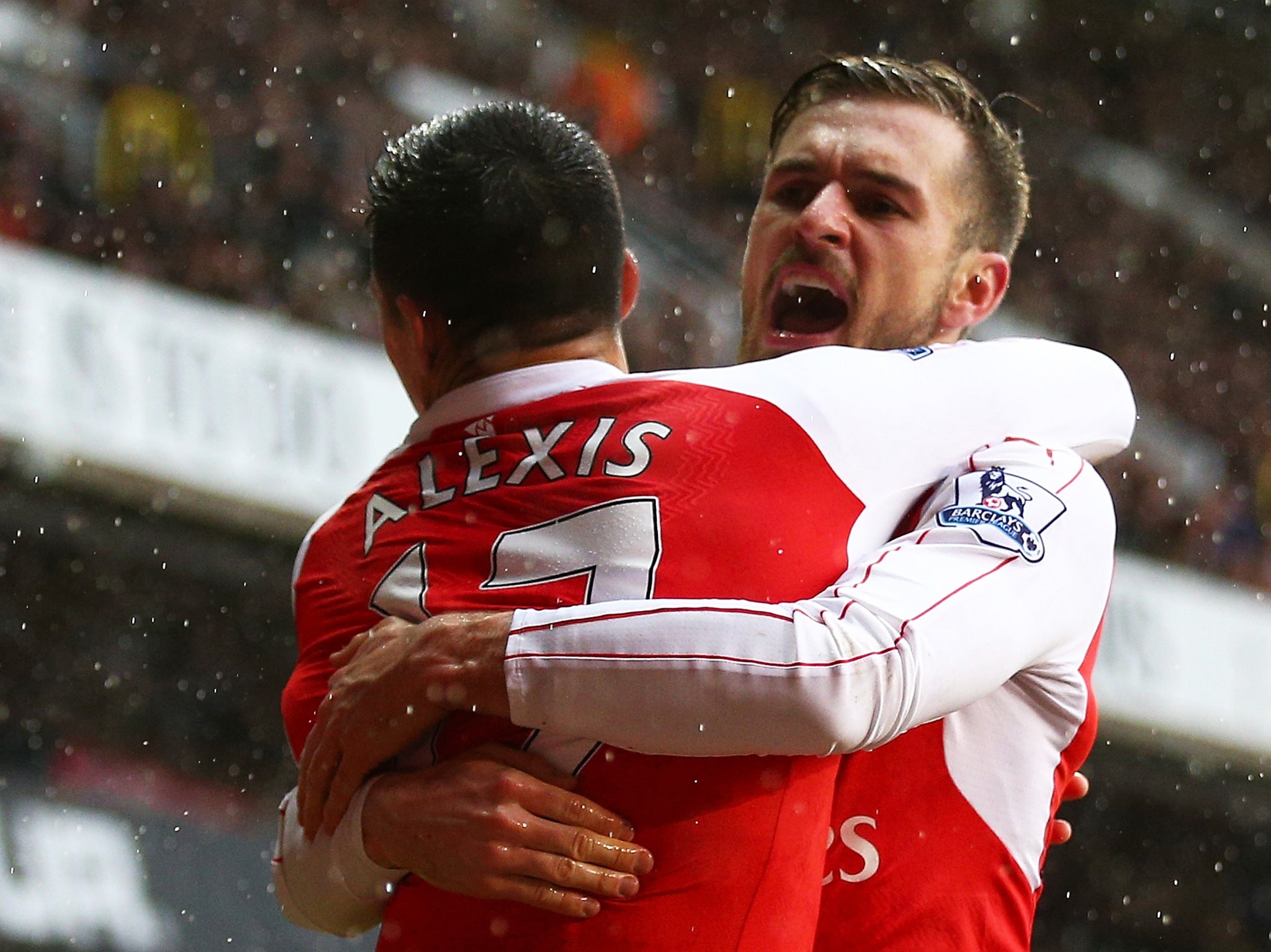 Sanchez and Ramsey celebrate a goal at White Hart Lane last season