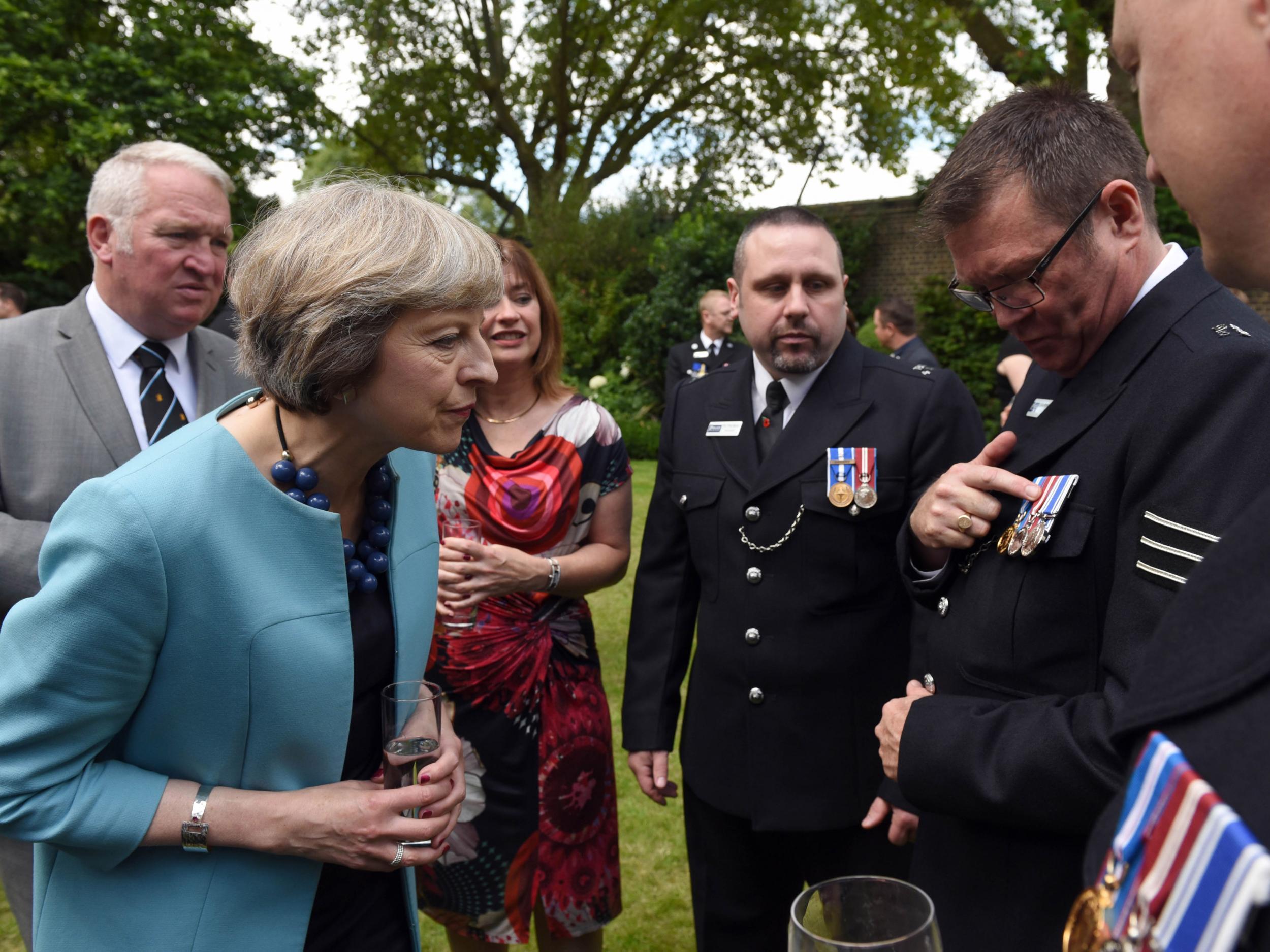 Relations between the police and Home Secretary have been strained, but one of Theresa May's first appointments as Prime Minister was to host the reception for police bravery awards