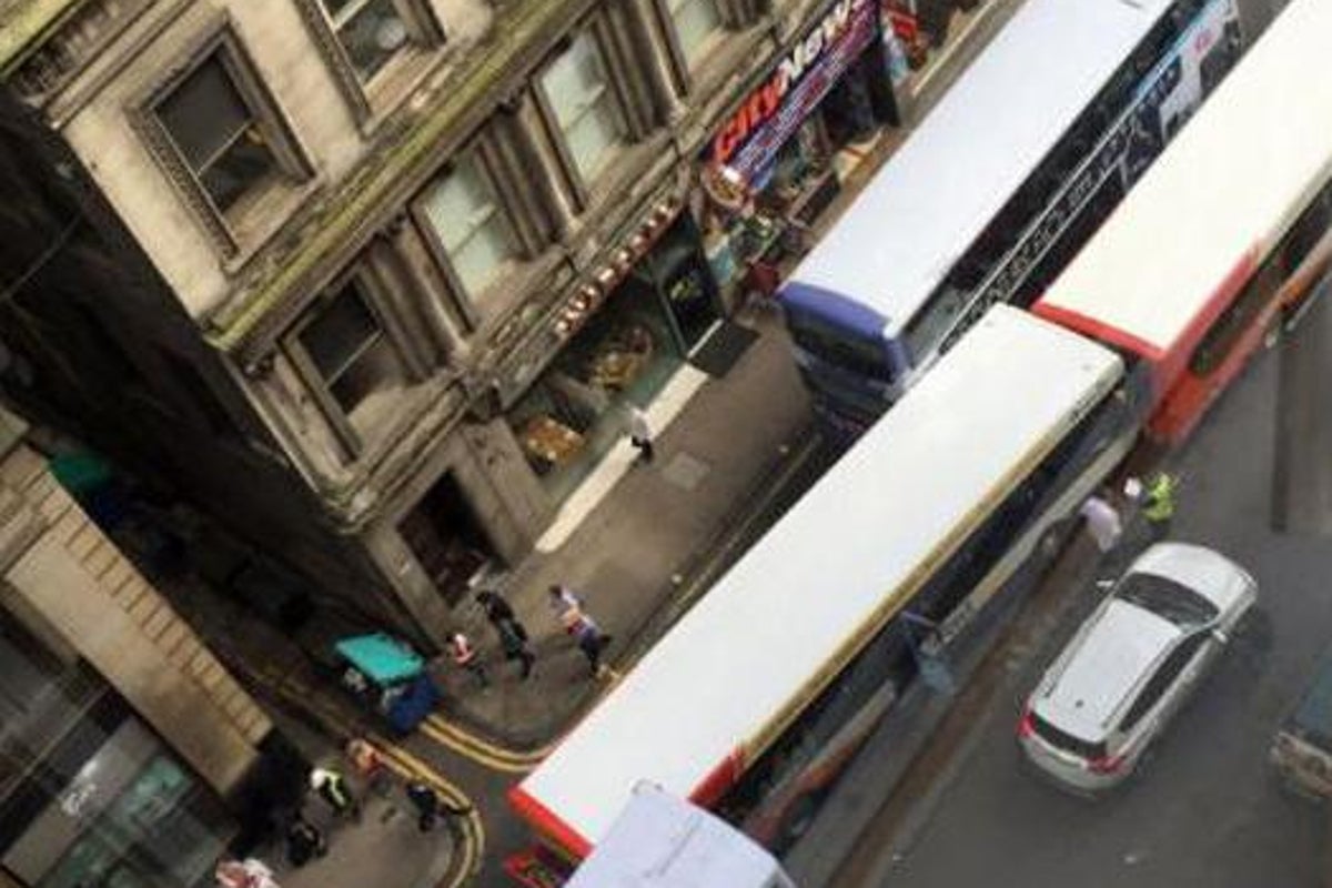 Two men injured in 'runaway' bus crash in Glasgow city centre | The ...