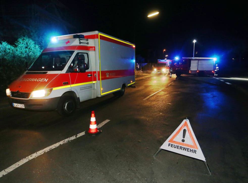 Emergency services vehicles at a roadblock set up in Würzburg following the attacks