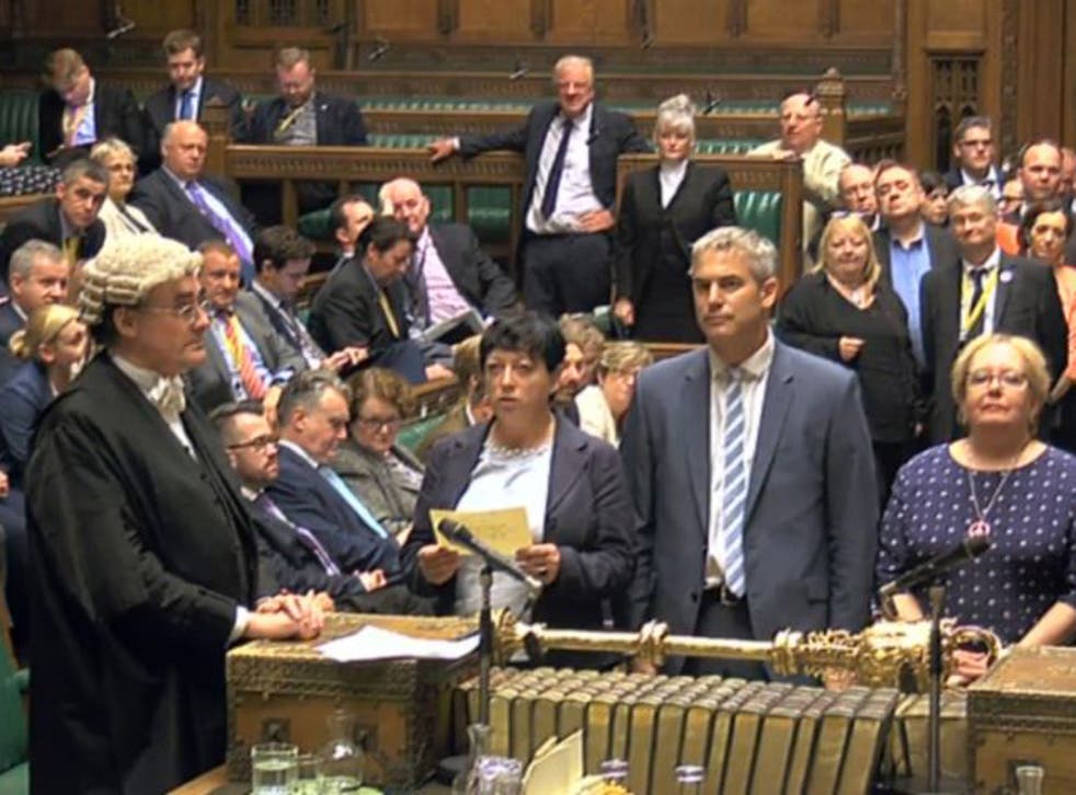 The result of a vote by MPs on whether to replace the Trident weapons system is read out in the House of Commons in London during a debate on whether to renew the Trident nuclear deterrent.