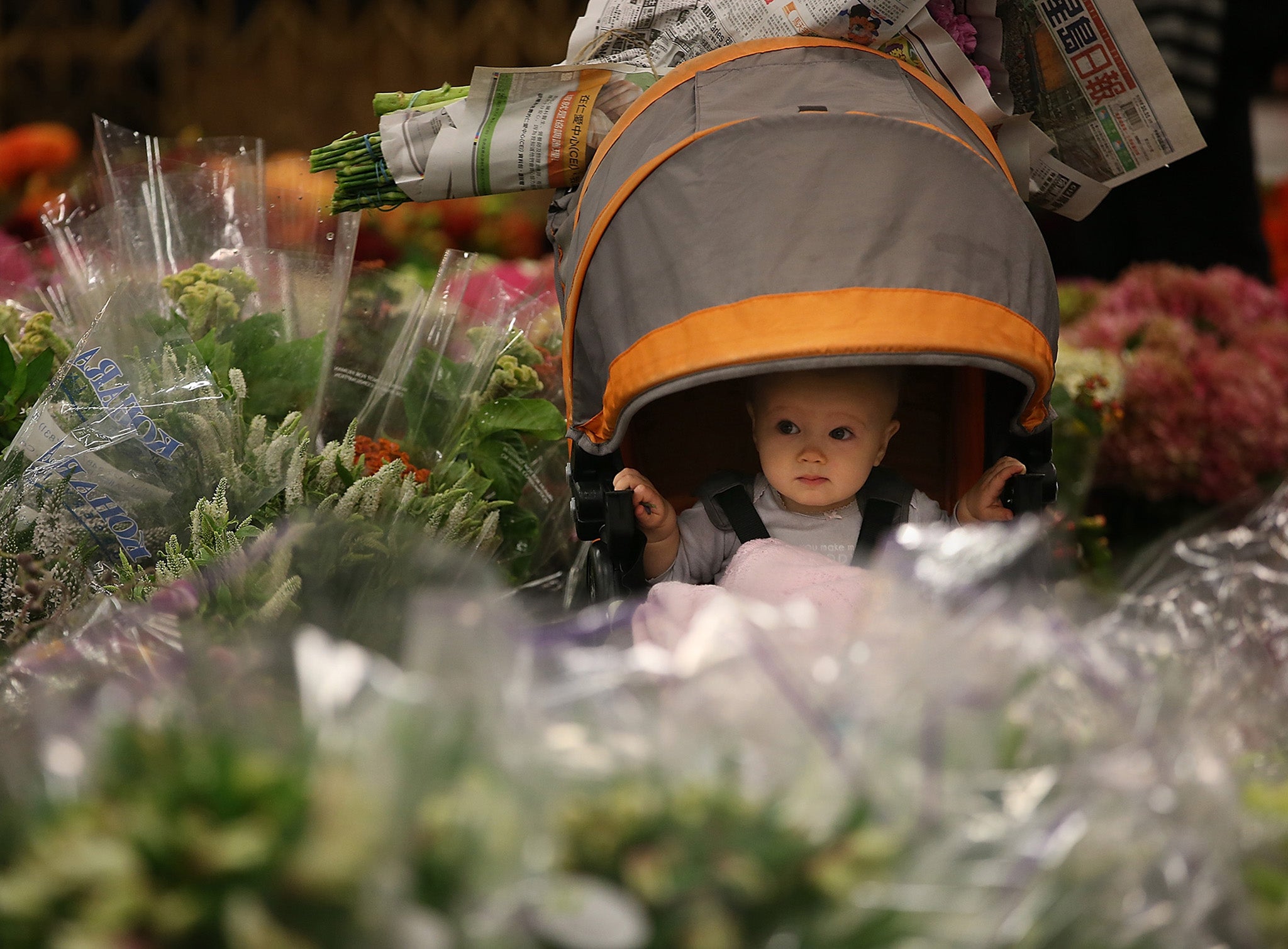 Covering up the pram with a blanket or muslin does not help cool a baby down