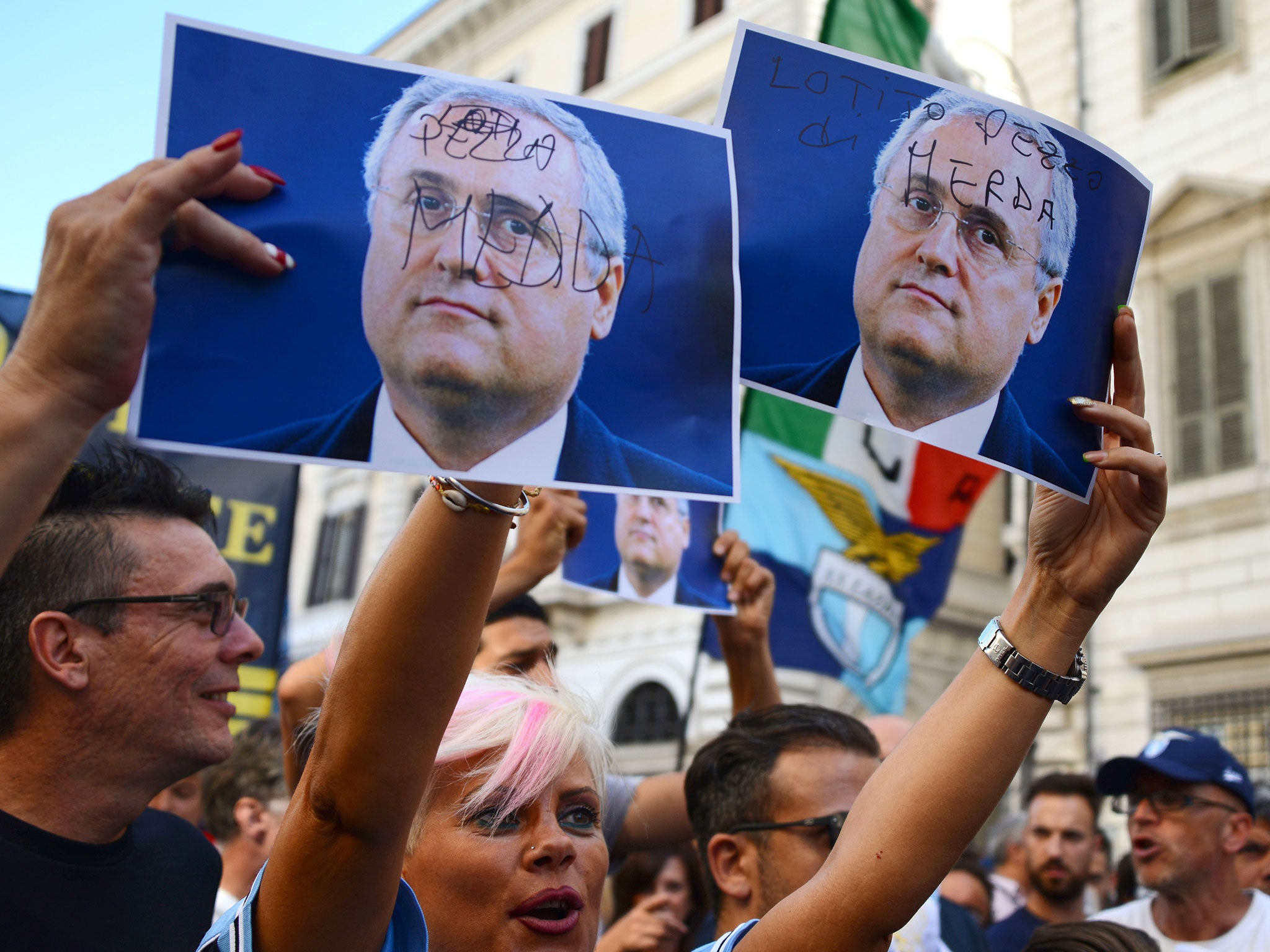 People have taken to the streets of Rome in protest against the club president