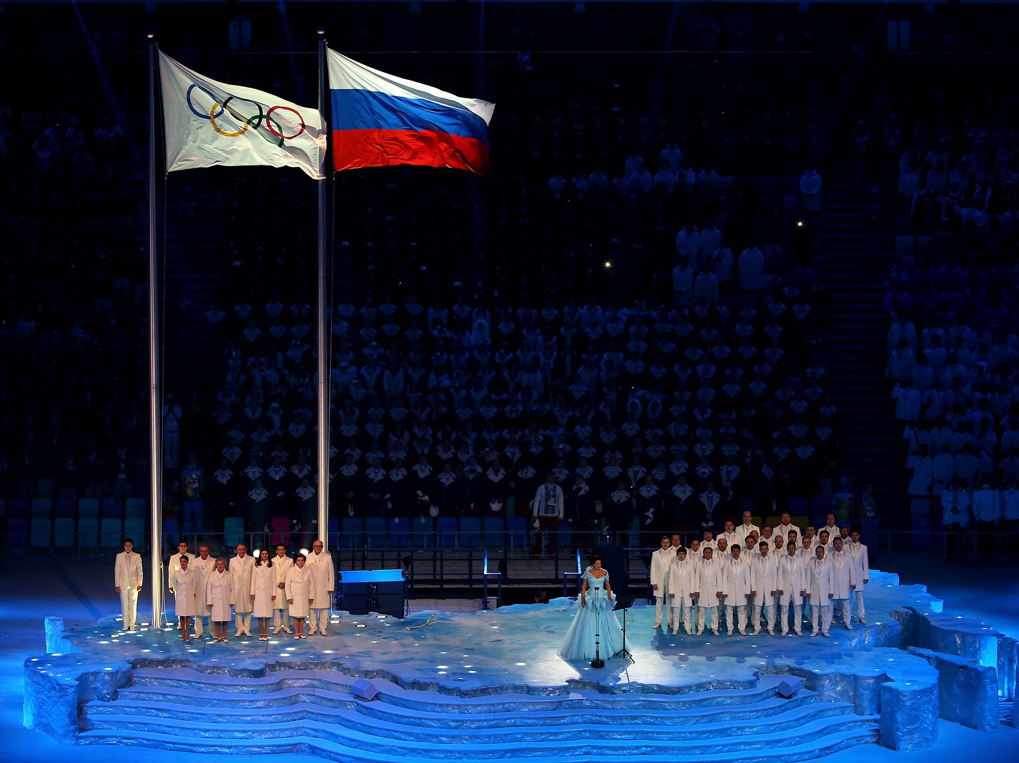 The Olympic flag is raised at the 2014 Sochi Games opening ceremony