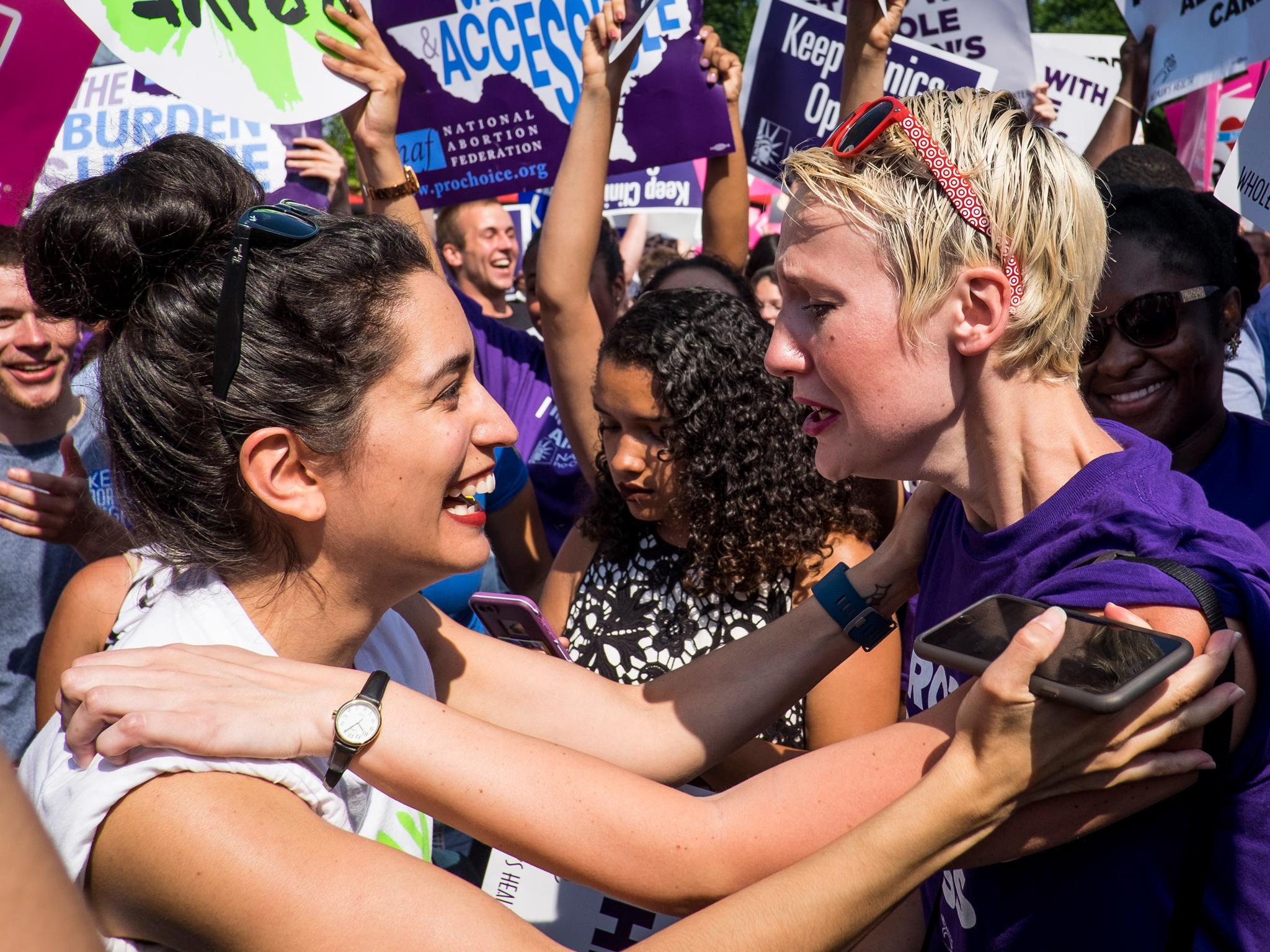 Abortion rights activists celebrating after the Supreme Court struck down Texas' restrictive HB2 law
