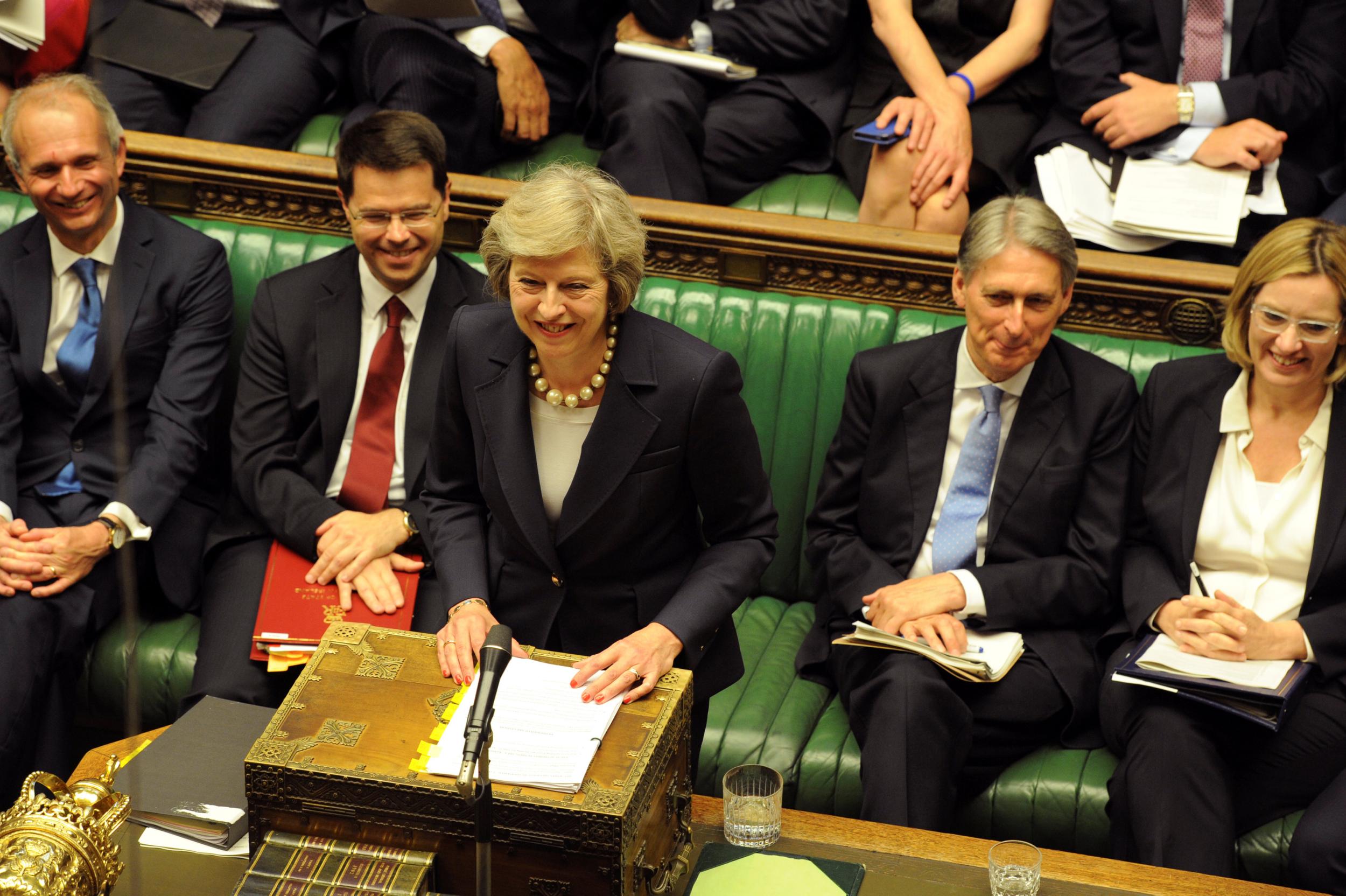 Theresa May addresses the House of Commons during her first Prime Minister's Questions
