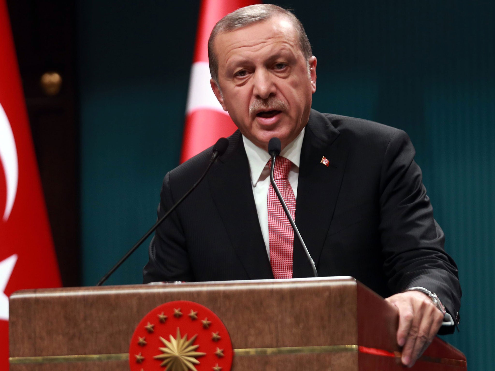 Turkish President Tayyip Erdogan speaks during a news conference following the National Security Council and cabinet meetings at the Presidential Palace in Ankara, Turkey, July 20, 2016