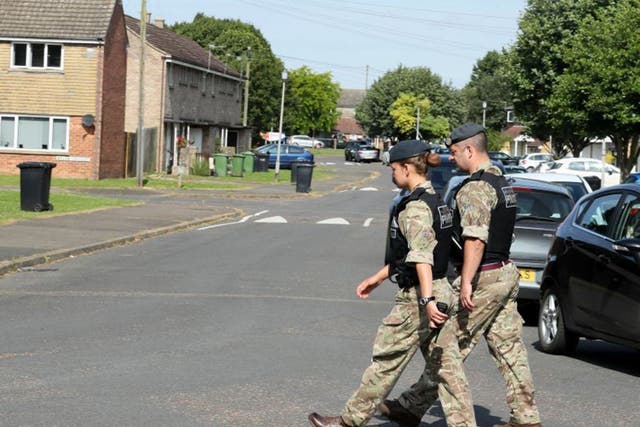 Military police patrolling the area near RAF Marham where the attempted abduction took place