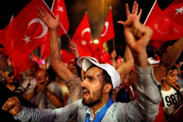 Supporters of President Erdogan in Istanbul's Taksim Square, where thousands of people have gathered in recent days