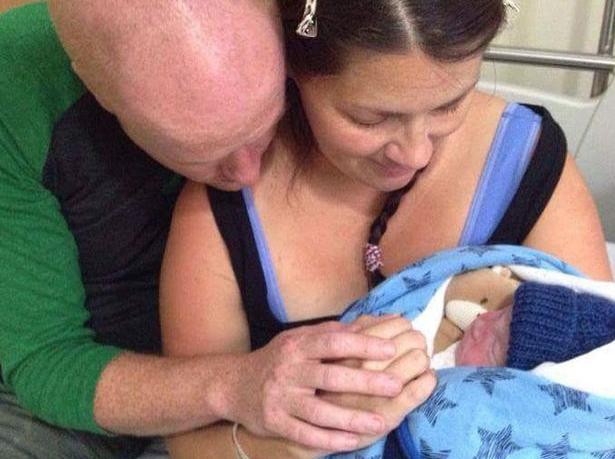 Lynsey and Mark Bell in hospital with their stillborn son Rory