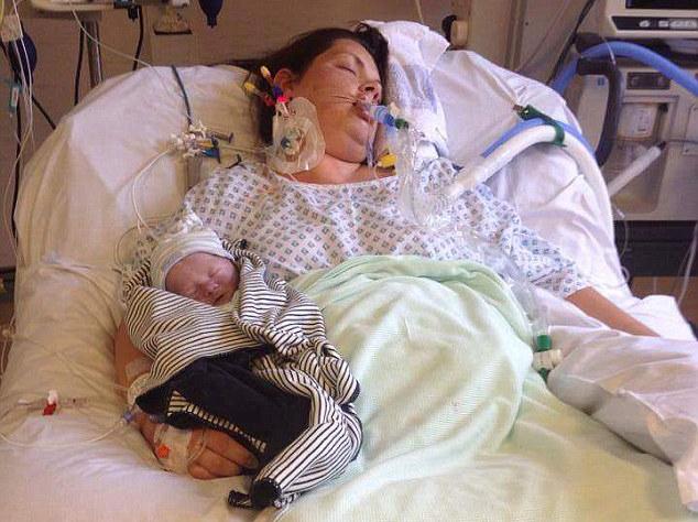 Ms Bell in a coma with her stillborn son Rory