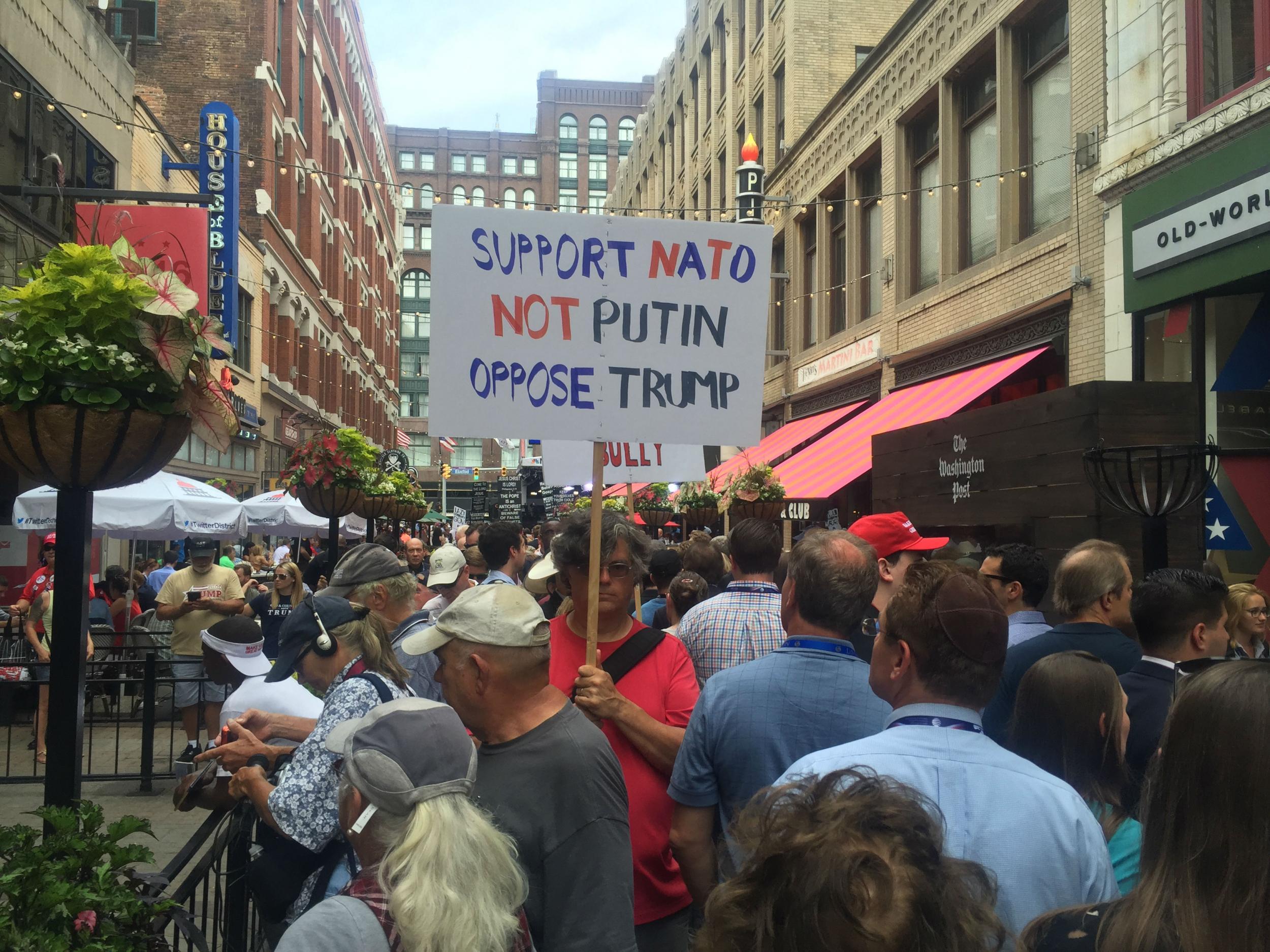 Protestor decrying Trump's comments on Nato