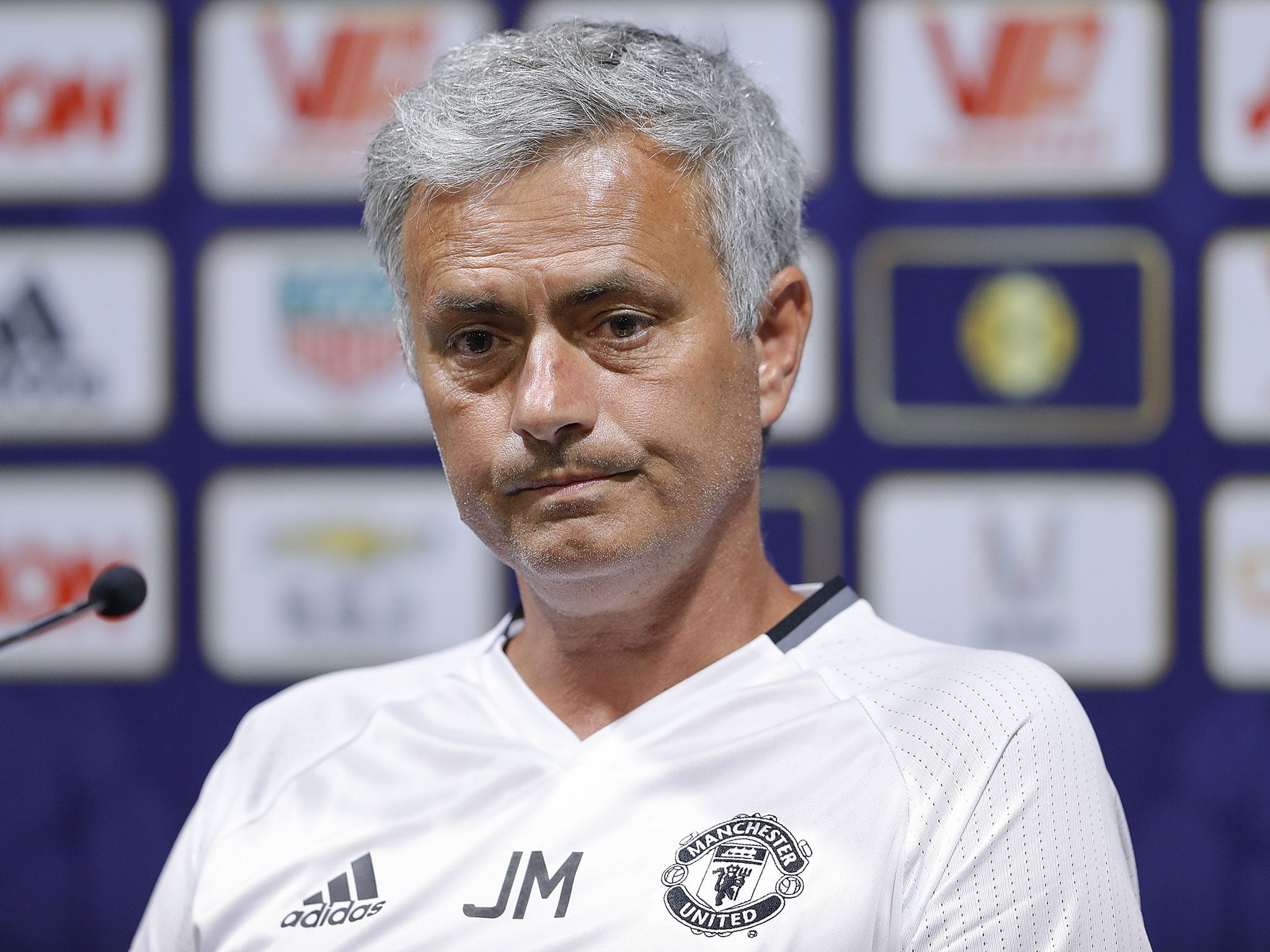 Mourinho answers questions during a press conference in China