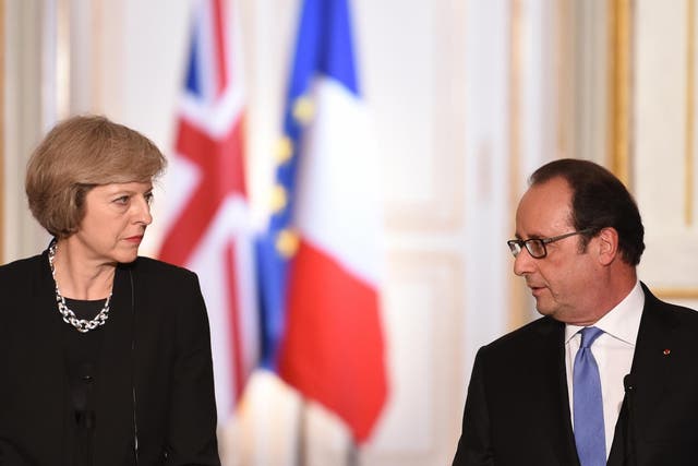 French President Francois Hollande and British Prime Minister Theresa May hold a joint press conference on July 21, 2016