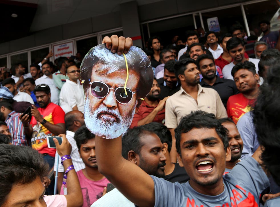 Rajinikanth fans leave a cinema in Chennai, India, after watching the actor’s new movie ‘Kabali’