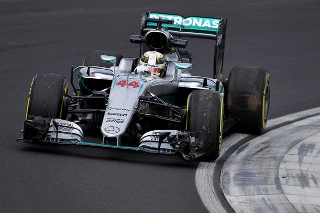 Lewis Hamilton limps back to the pits after his crash in practice