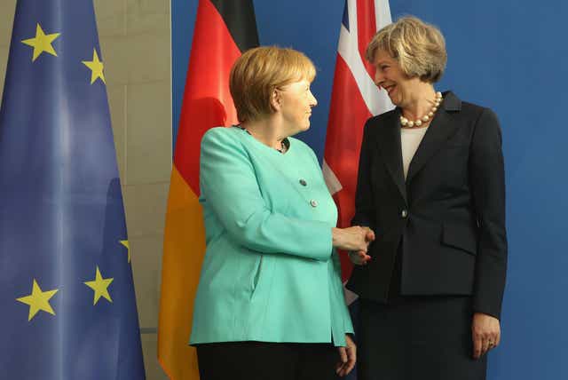 Theresa May has been urged by German Chancellor Angela Merkel to invoke Article 50 without delay