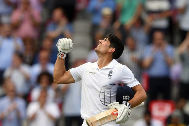 Alastair Cook celebrates reaching his hundred at Old Trafford