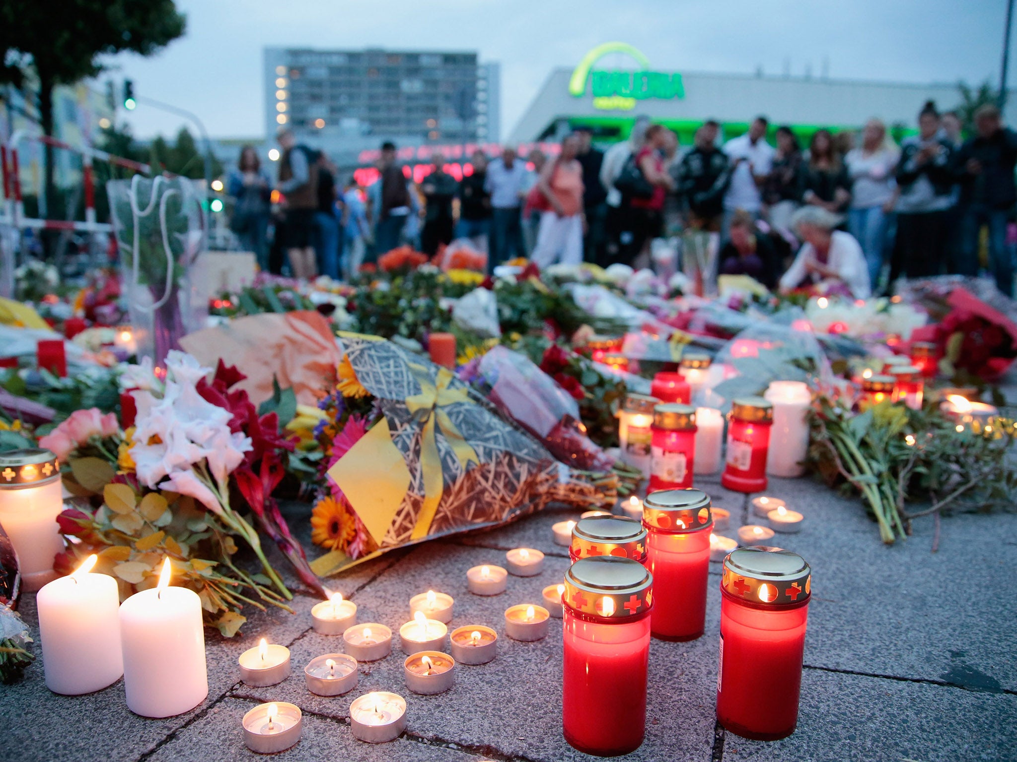 A memorial to those shot by the Munich gunman, who was said to be obsessed with mass shootings
