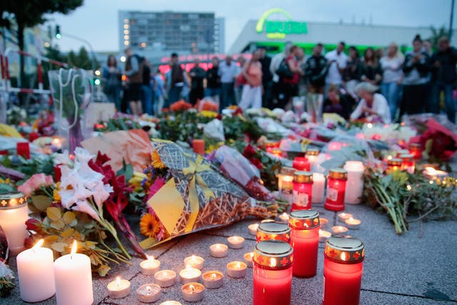 A memorial to those shot by the Munich gunman, who was said to be obsessed with mass shootings