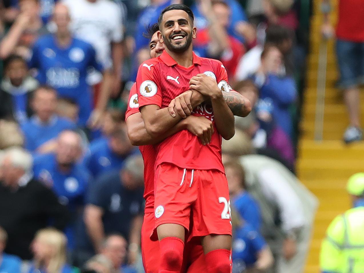 &#13;
Leonardo Ulloa celebrates with Mahrez after his sensational goal &#13;