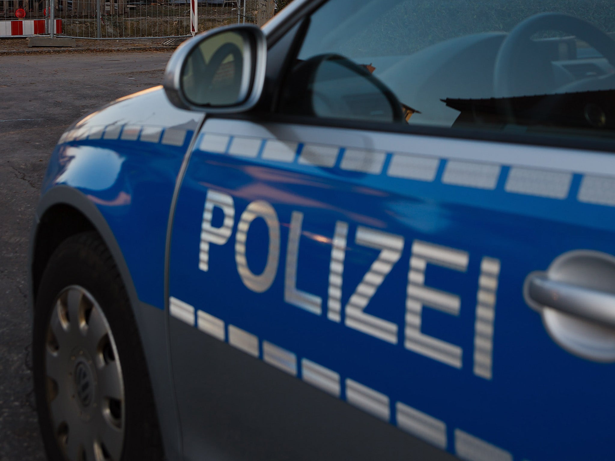 File. A police car stands in front of an apartment in Zwickau, Germany