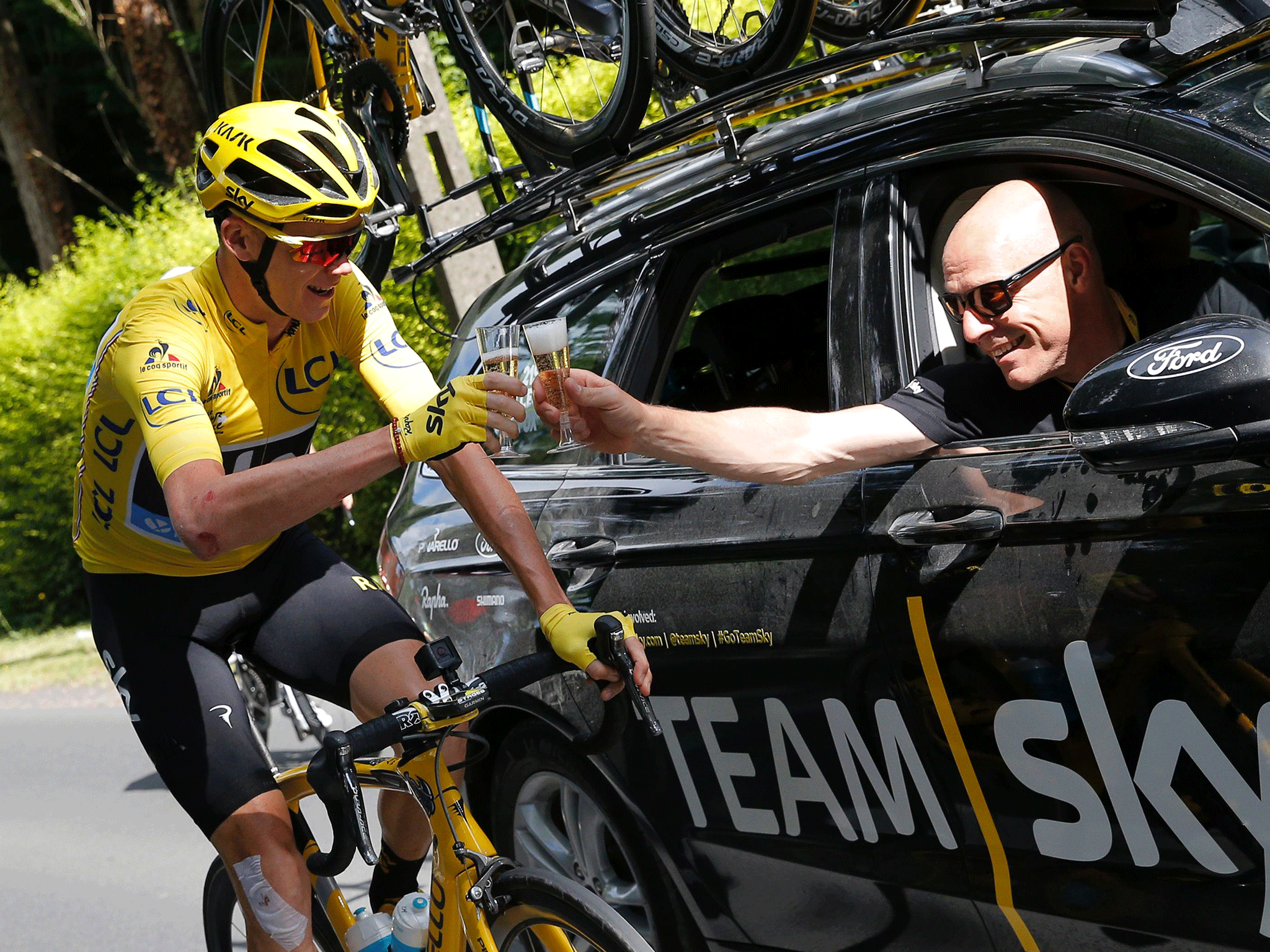 Froome with Team Sky director Sir Dave Brailsford