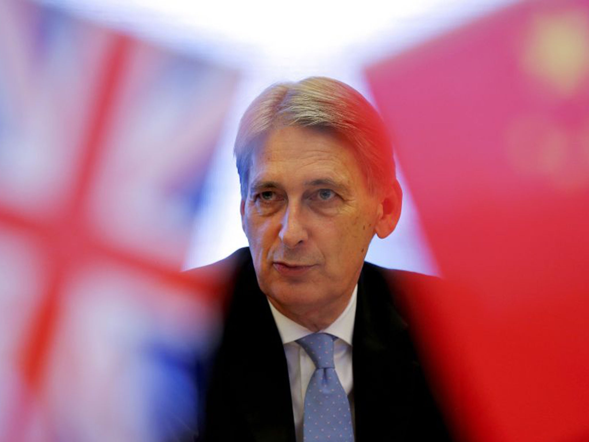 Philip Hammond attends a meeting last week at the Bank of China head office building in Beijing