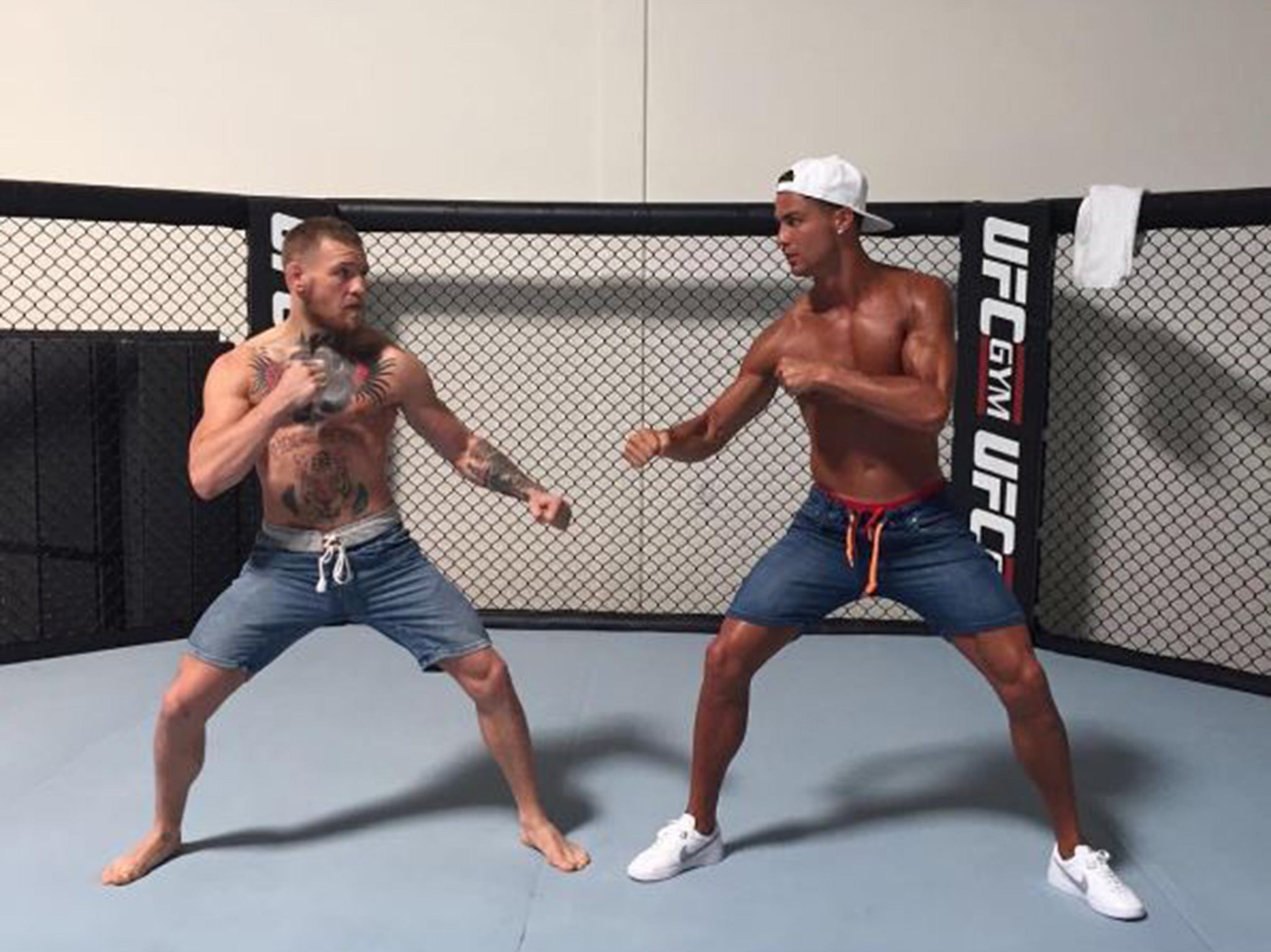McGregor and Ronaldo stare each other down in the Octagon