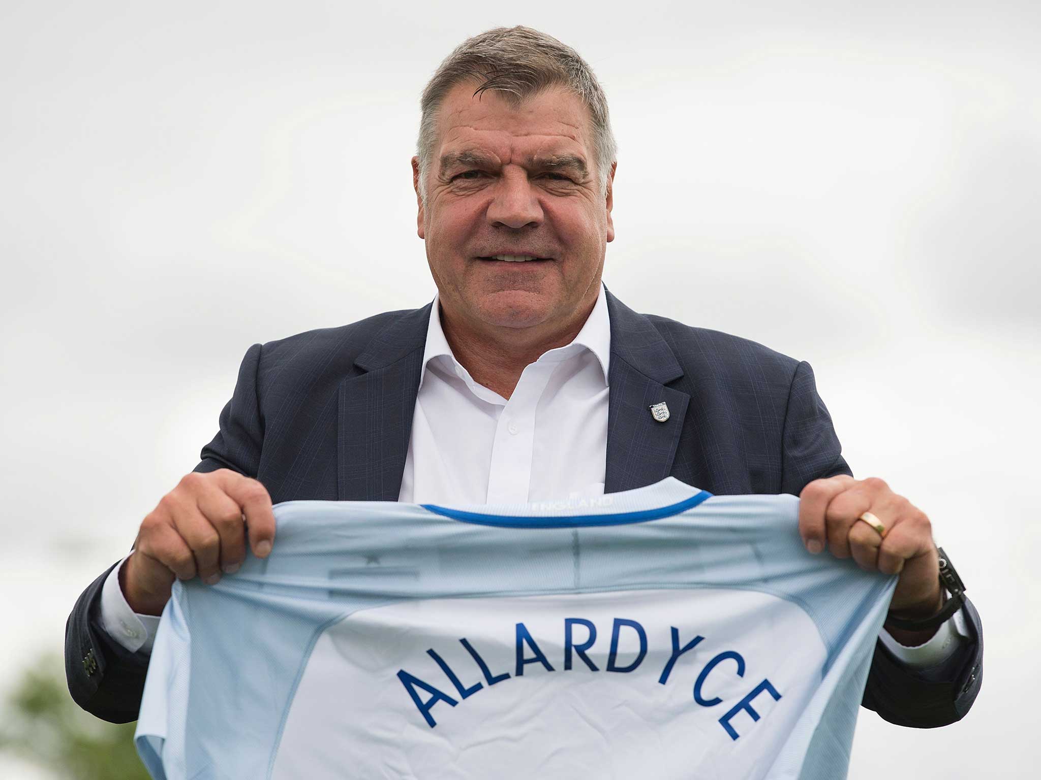 Allardyce is presented to photographers after the press conference