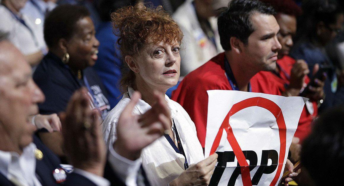 Ms Sarandon held a sign against the Trans-Pacific Partnership trade deal