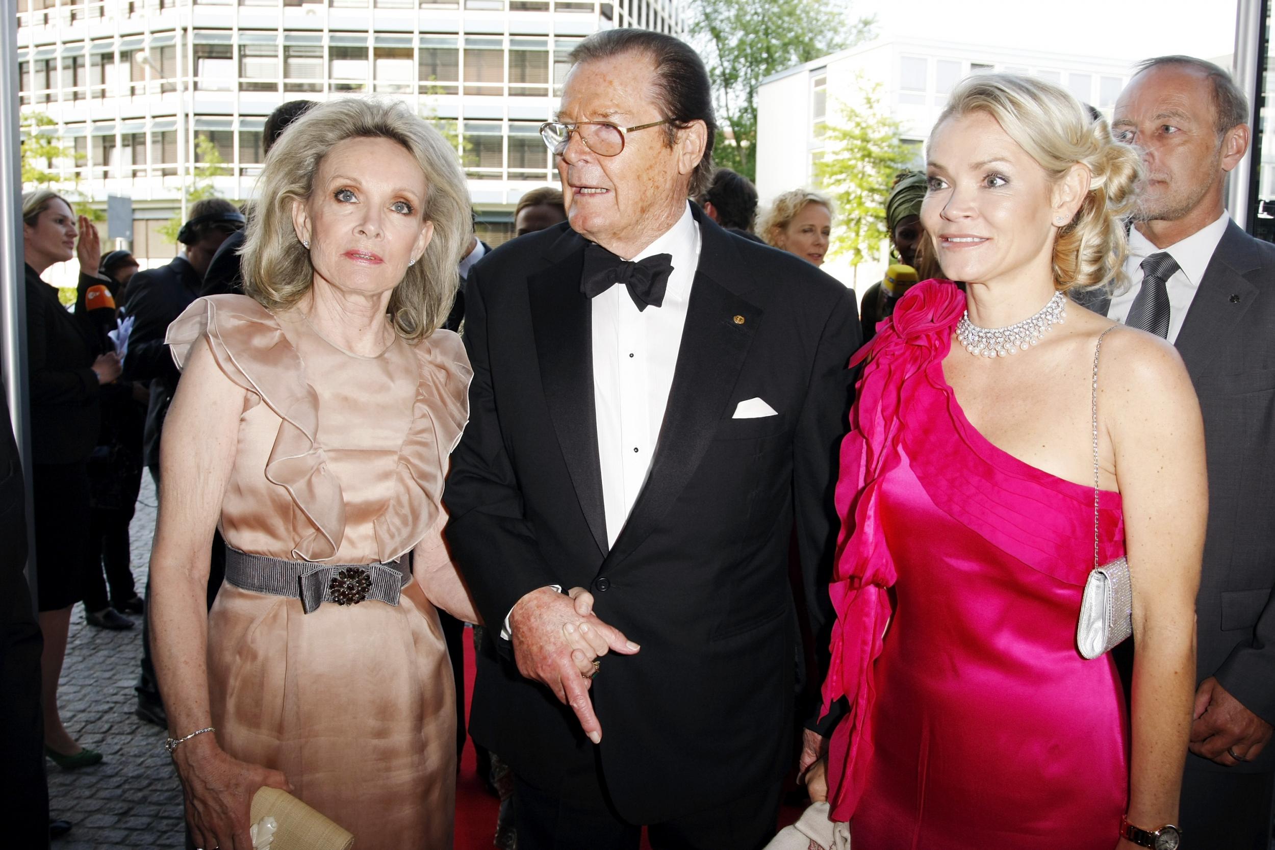 Actor Roger Moore and partner Kiki Tholstrup and her daughter Christina Knudsen