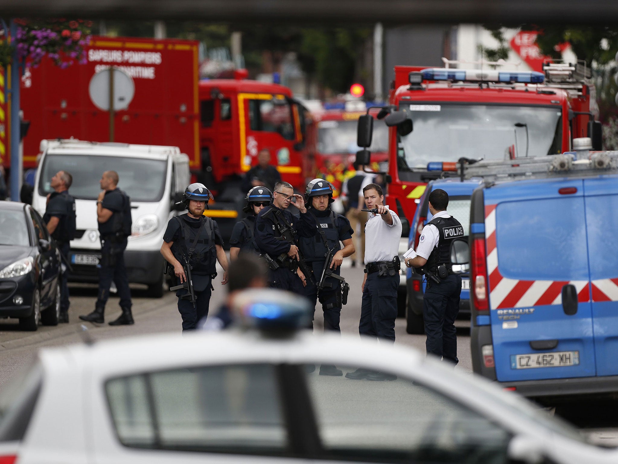 French police at the scene of the attack on a church in Saint-Etienne-du-Rouvray, northern France, on July 26
