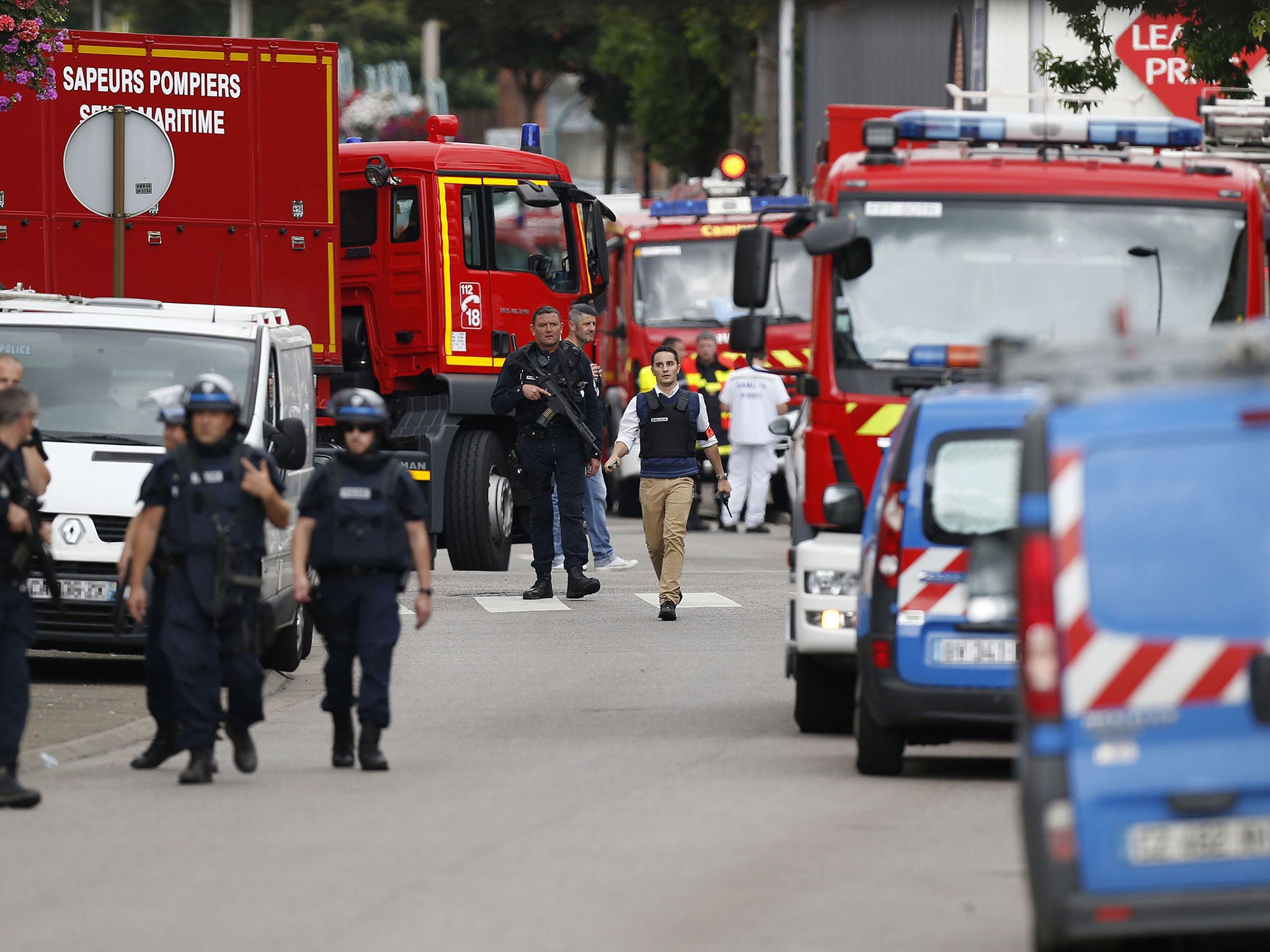 French police at the scene of the attack on a church in Saint-Etienne-du-Rouvray, northern France, today (AFP/Getty)