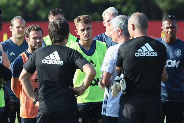 Jose Mourinho conducts a training session with his Manchester United players