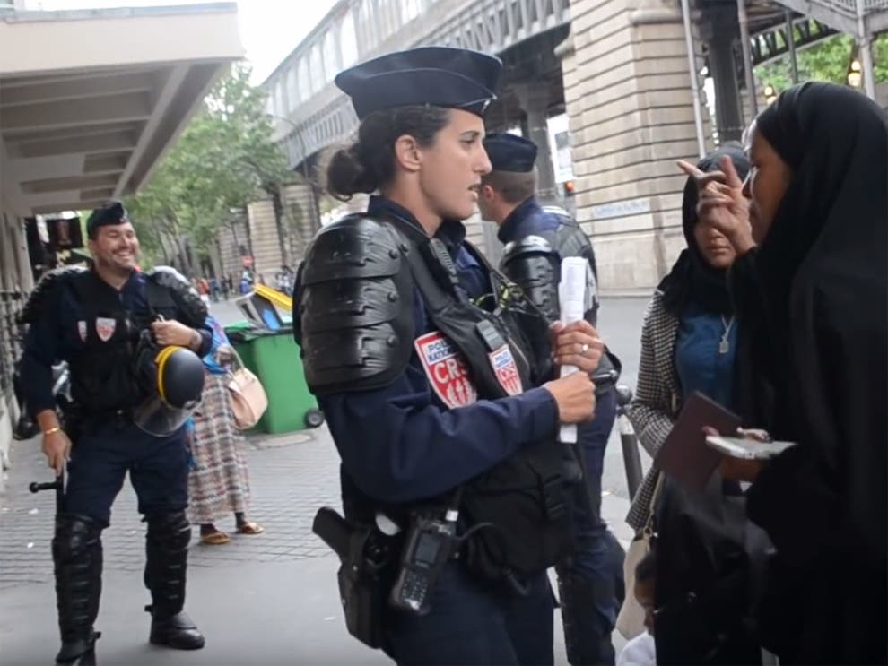 French Policeman Filmed Ridiculing Weeping Refugee Woman