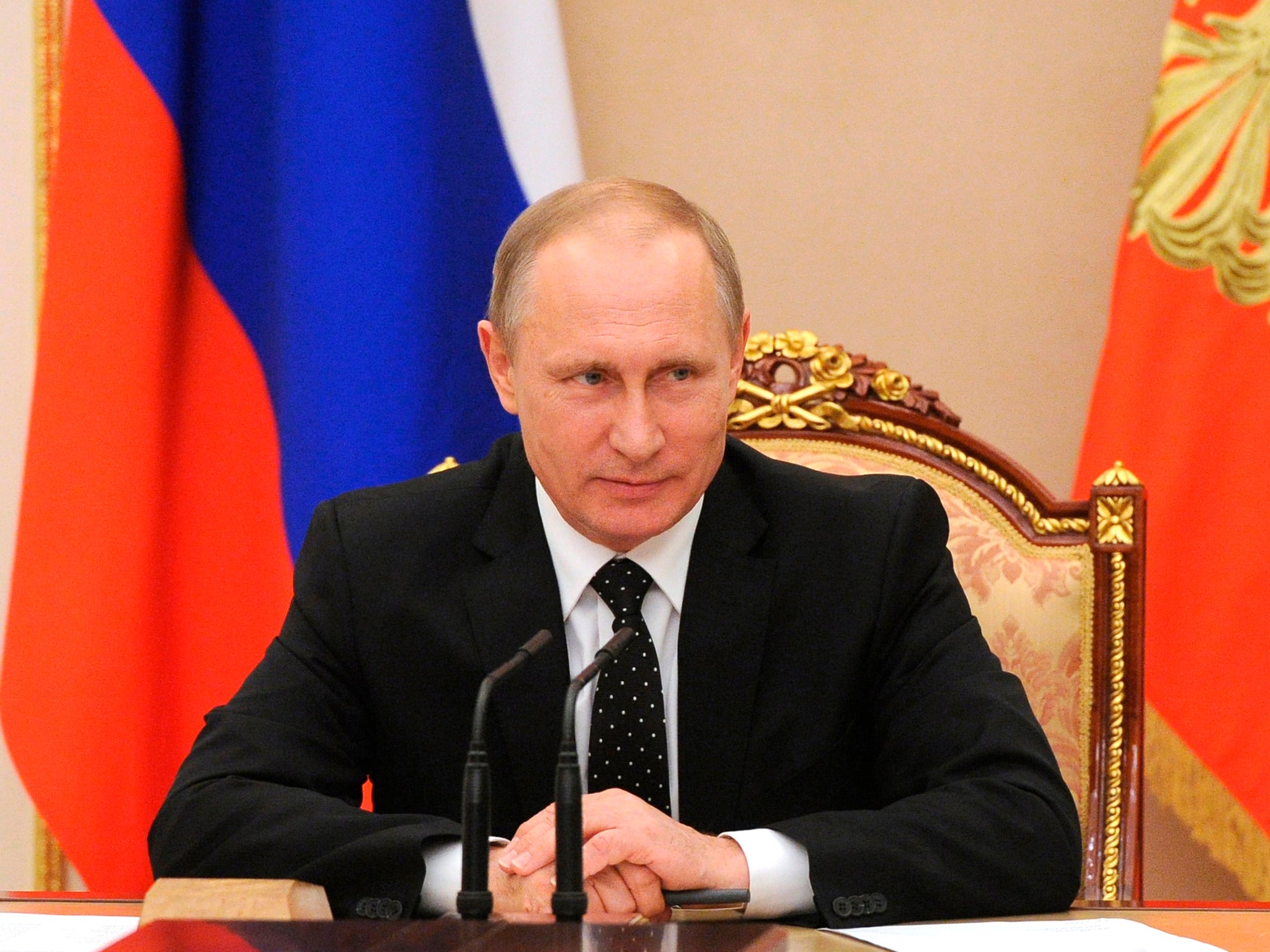 Vladimir Putin has warned that deaths in the Crimea of Russian servicemen will not be ignored