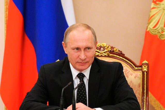 Vladimir Putin has warned that deaths in the Crimea of Russian servicemen will not be ignored
