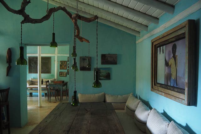 Turquoise coloured walls, reminiscent of the water colour, sets the perfect tone to showcase work from a wide range of Brazilian artisans at the UXUA Casa Hotel in Trancoso